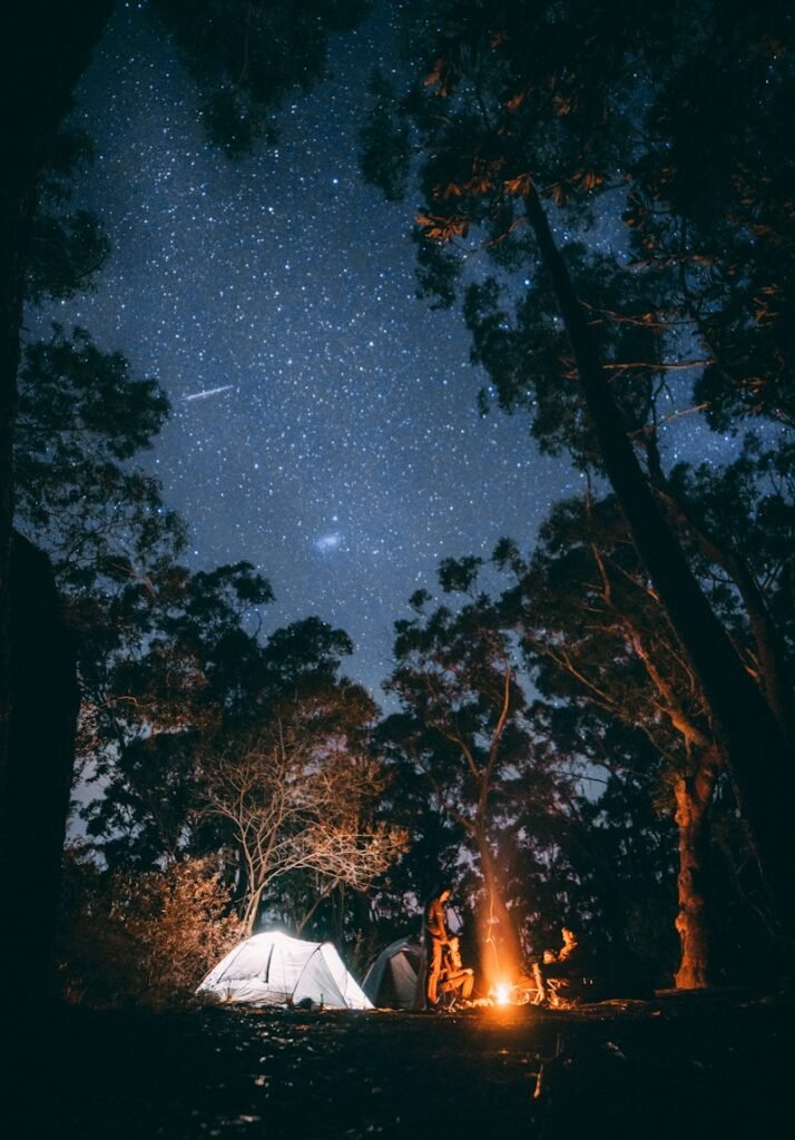 Tent under the night sky while desert camping
